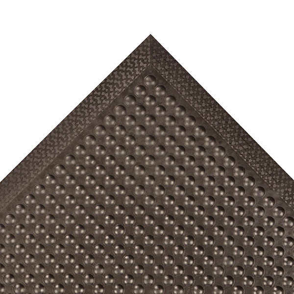 447 C BL Floormat.com Comfort-Eze™ is constructed with a unique solid rubber design that stimulates worker comfort and promotes product longevity. Offset bubbles on both the top and bottom of the mat provides flex and creates airflow resulting in maximum comfort for workers required to be on their feet for long periods of time. Competitive products feature only a flat or hollowed bottom which reduces the comfort of the mat. Although intended for use in dry environments, the top surface design is easy to wipe clean and the durable rubber compound is highly resistant to many cleaners and disinfectants so occasional spills can be cleaned up quickly and easily. Molded beveled edges on all four sides eliminates trip hazards by allowing for easy access onto and off the mat. <ul> <li>Long-lasting rubber compound</li> <li>Bubbles are molded on and offset on the top and bottom of the mat to maximize flex and create air flow, all to enhance the ergonomic benefit</li> <li>Durable rubber top surface easy to wipe clean using most cleaners and disinfectants</li> <li>All 4 sides feature a molded beveled border</li> </ul>
