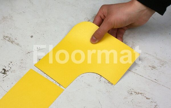 90 degree 100 1 Floormat.com Floormat.com warehouse markers are durable, self-adhesive signs constructed from industrial grade plastic. Intended for use in factory warehouses and buildings where restrictions and safety notifications need to be highlighted.