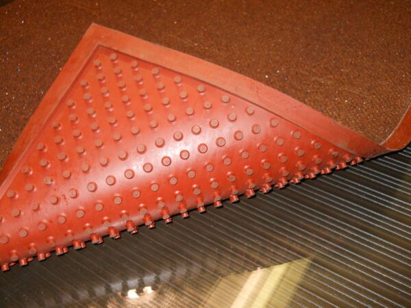 ComfortSuperG Floormat.com Extremely slip-resistant floor mats for wet, oily and greasy floors, ramps, stairs, walk-in freezers and other slippery surfaces <ul> <li>Made with crushed garnet and ceramic beads for secure footing</li> <li>Backing restricts creeping</li> <li>Low profile eliminates tripping hazard and allows it to be placed under thresholds</li> <li>Resists fungal & bacterial growth</li> <li>The Grip Rock mats are 3/8" thick</li> <li>They are 3' wide and can be purchased per lineal ft as well (3' x 3' for example)</li> </ul> <h3>Grip Rock slip-resistant safety mats are:</h3> <ul> <li>Slip-resistant in water, grease, and oil</li> <li>Extremely tough and durable</li> <li>Flexible even in freezing temperatures</li> <li>Lightweight and thin (1/8 inch thick, a 3' x 10' is only 25 pounds)</li> <li>No installation needed</li> <li>Easy to handle, clean, and maintain</li> <li>The regular version has a tacky polyurethane backing that is especially conducive to temporary floor adhesion and slip resistance. It is meant to be removed and cleaned and moved around as necessary.</li> </ul> <strong>Grip Rock slip-resistant floor mat</strong> has a unique surface, incorporating round textured ceramic beads and crushed garnet to minimize slipping while facilitating easy cleaning. Grip Rock safety mats are designed to be slip-resistant in wet, hazardous areas including walk-in freezers, wet and slippery ramps, and stairs indoors or outdoors. Grip Rock safety mat is constructed of rugged components: <ul> <li>Tacky and durable polyurethane backing to prevent hydroplaning - mat stays put</li> <li>A middle layer of fiberglass that prohibits tearing and increases strength</li> <li>A durable top layer of ceramic beads and crushed garnet in a polyurethane matrix</li> <li><a href="https://www.floormat.com/super-g/"><strong>Super G</strong></a> has the same basic properties of Grip Rock but has a special abrasive top surface designed specifically for use in kitchen fry areas, work stations, garages and production areas in factories that are often greasy, oily and dangerous. Super safety mat is constructed of rugged components: <ul> <li>Tacky and durable polyurethane backing to prevent hydroplaning - mat stays put</li> <li>A middle layer of fiberglass that prohibits tearing and increases strength</li> <li>A durable top layer of crushed garnet in a polyurethane matrix</li> </ul> </li> </ul>
