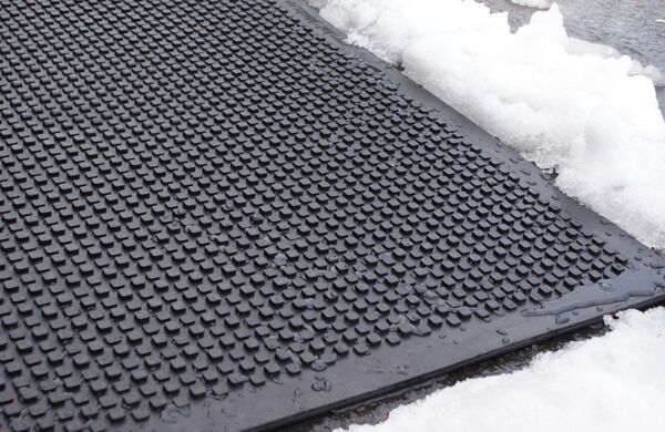 HOT blocks door landing mat Floormat.com <h1 style="text-align: center;">Temporarily Unavailable</h1> <h2 style="text-align: center;"><a href="https://www.floormat.com/melt-step-snow-melting-mat/">Try Our Melt Step Snow Melting Mat Instead</a></h2> Avoid the hazardous fall on the ice this winter! The HOT-blocks™ outdoor industrial heated mats have been designed for keeping stairs, doorways, handicapped ramps, walkways and alleyways safe and ice free!<b> </b>They are safe and secure from accidents due to slipping and falling. They melt snow and ice on contact. The HOT-blocks™ outdoor heated mats are designed to withstand harsh winter conditions. <b>(GFCI Power Cord not included.)</b> <ul> <li>These mats are Eco friendly, inter-connectable, and versatile.</li> <li>100% Virgin Rubber</li> <li>Dimensions: 36" L x 24" W x 0.31" H</li> <li>Weight: 18 lbs</li> </ul>