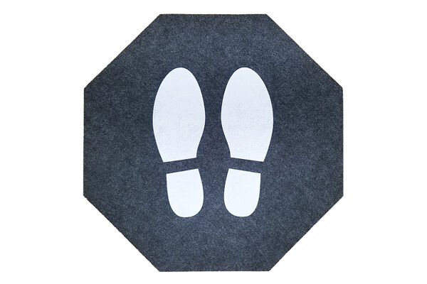 Stick and Stand Isolated full mat 900x600 1 Floormat.com Stick-and-Stand mats are adhesive-backed social distancing mats designed to mark a safe place for customers to stand while waiting in lines. <strong>Sold by case only, with 6 mats per case.</strong> <ul> <li>Universal "stop sign" shape with shoe prints marks where customers should stand; mats can be placed at safe intervals in virtually any configuration.</li> <li>Adhesive backing keeps the mat flat and in place, even with heavy cart and buggy traffic.</li> <li>Mats can be left in place during daily floor cleaning; floor scrubbers, mops, and brooms will pass right over them without causing damage.</li> <li>Less likely than floor decals to leave a sticky residue.</li> <li>Treated with an anti-microbial formula for protection from odors.</li> <li>Low-profile design with a high-traction surface to enhance slip resistance.</li> <li>Mat lifetime is up to 3 to 4 months under normal use.</li> </ul>