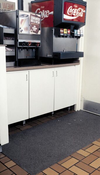 brite tack 1 Floormat.com The Brite-Trac™ Matting is designed for areas your customers will see - buffet lines/ beverage stations.  Features an aggressive abrasive surface for great traction. Brite-Trac™ products are all manufactured specifically for maximum slip resistance and safety.  From the backing, which restricts creeping; to the inner fiberglass layer for strength; to the extreme textured surface.  The low profile allows carts to travel easily over it and reduces a tripping hazard. Provide your employees/customers with protection from slips, trips and falls, which can be costly. <ul> <li>Thick- 1/8" Roll- 3' x 40'</li> <li>Slip resistant when wet/icy</li> <li>Stays flexible at freezer temperatures</li> <li>Tough, but lightweight</li> <li>Easy to clean & handle</li> <li>Reduces slips/falls</li> <li>Resists fungal & bacterial growth</li> </ul>