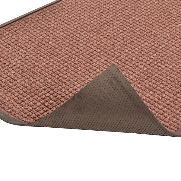 guzzler 3 Floormat.com Guzzler™ is intended for use in medium to heavy traffic areas, the raised, crushproof waffle design of Guzzler™ aggressively scrapes and cleans, while the rubber-edged perimeter entraps dirt and moisture for superior water and soil control. Molded rubber “cleats” on the underside of the mat grip the underlying surface minimizing mat movement. <ul> <li>High/low waffle pattern facilitates scraping and keeps moisture and debris away from foot traffic</li> <li>Raised rubber border on all 4 sides traps moisture and debris for easy removal</li> <li>Molded rubber cleats on the bottom of the mat grip underlying surfaces and minimize mat movement</li> <li>26 ounces of tufted yarn per square yard</li> <li>3/8 inch overall thickness for use in narrow clearance doorways</li> </ul>