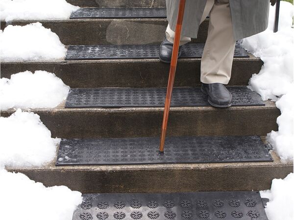 hotflake stair 1 Floormat.com <h1 style="text-align: center;">Temporarily Unavailable</h1> Melt snow & ice outside your facility for safer footing. <b>(<a href="https://www.floormat.com/gfci-power-cord/">GFCI Power Cord</a> not included.)</b> <ul> <li>Salt and sand no longer necessary</li> <li>No more shoveling or back pain!</li> <li>Floor mats are completely waterproof and offer great anti-slip traction, even in the worst conditions!</li> <li>Safe to use on PVC decking</li> <li>The floormat will maintain an average AMBIENT temperature of 44 to 50 degrees Fahrenheit (7 to 10 degrees Celsius). Don’t be concerned about your pets burning their feet – you may see them lying on the mats for warmth.</li> <li>Connect up to ten: 120V treads, fifteen: 230V treads and fifteen: 240V treads together using one GFCI</li> <li>100% virgin SBR rubber</li> <li>These mats can connect up to 10 (120V) or 20 (240V) <a href="https://www.floormat.com/hotflake-stair-tread/">rubber stair treads</a>, up to 5 (120V) or 10 (240V) <a href="https://www.floormat.com/hotflake-door-landing-mat/">rubber doormats and landing mats</a> AND up to 4 (120V) or 8 (240V) <a href="https://www.floormat.com/hotflake-walkway-driveway-mat/">rubber walkway and driveway mats</a>. In any combination, connections should not exceed 15 amps per GFCI.</li> </ul>