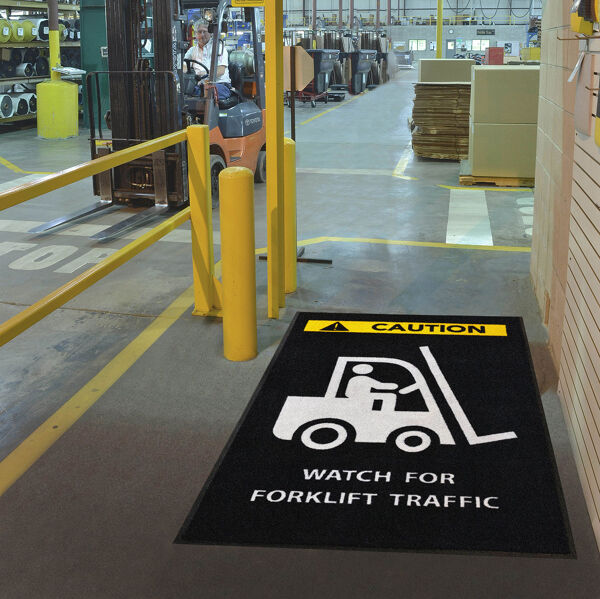 messageMat forklift Floormat.com Safety Message mats make your safety message loud and clear while keeping facilities cleaner and safer. Pre-printed message mats warn employees who may be entering a hazardous area, may need special ear or eye protection, or just act as a reminder to think and act safely in work environments. Pre-printed message mats offer functionality as an entrance mat cleaning dirt and moisture from shoes, keeping facilities cleaner and safer. Select messages are also available in Spanish. <ul> <li>14 pre-printed messages to choose from</li> <li>Highly visible colors and graphics for immediate identification</li> <li>24 ounce nylon top surface provides excellent moisture absorption and retention</li> <li>Heavy duty vinyl backing reduces mat movement</li> <li>Select messages also available in Spanish</li> </ul>